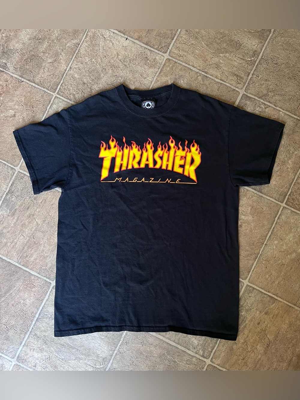 Thrasher Black Tee with Yellow-Orange Flame Logo
